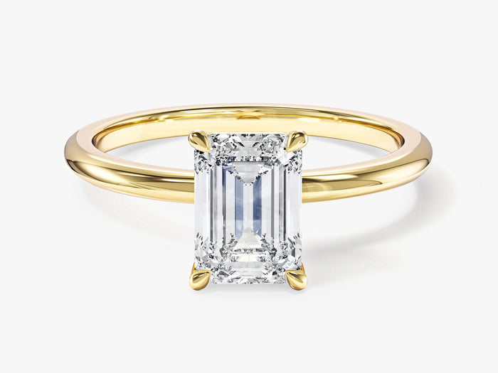 Classic emerald cut lab grown diamond solitaire engagement ring in yellow gold, front view