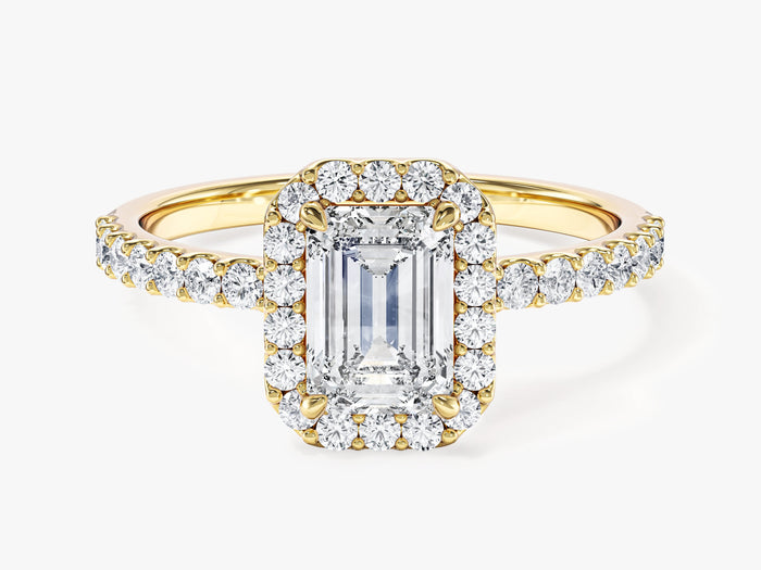 Emerald cut lab grown diamond four claw halo ring with micro pave band in yellow gold, front view