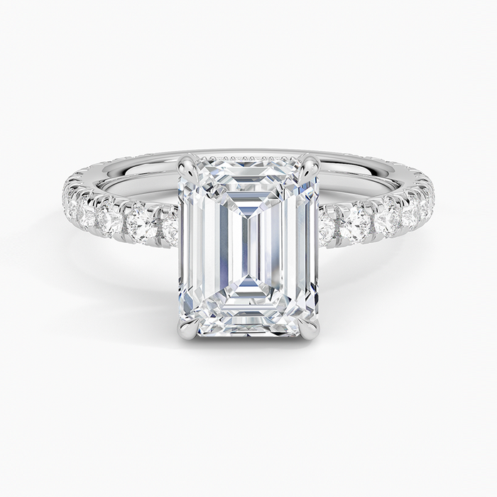 Emerald cut moissanite hidden halo French pave engagement ring in white gold, top view
