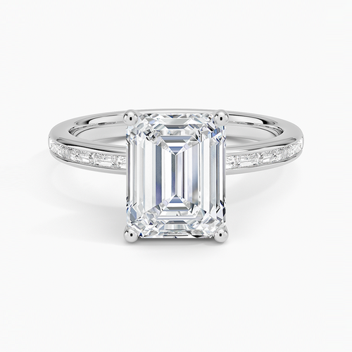 Emerald cut moissanite with channel set baguette shoulders in white gold, top view