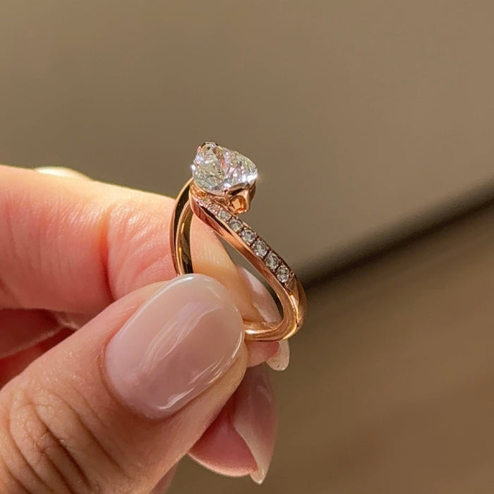 East west pear moissanite swirl pave engagement ring in rose gold, view 2