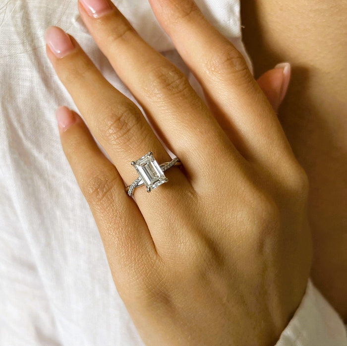 Emerald cut moissanite twisted pave engagement ring in white gold, view 2