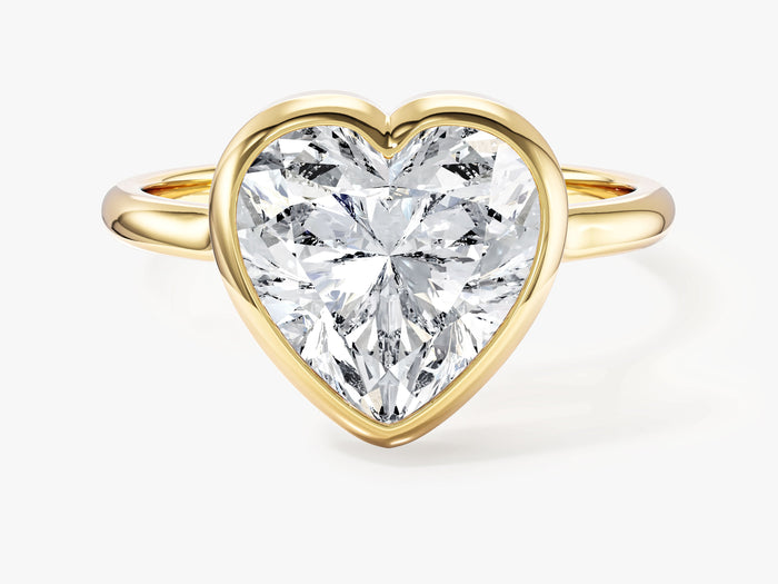 Bold heart lab grown diamond bezel statement engagement ring in yellow gold, front view