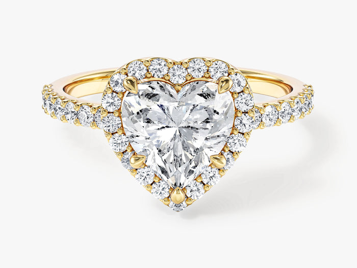 Heart cut moissanite halo engagement ring with pave shoulders in 14K yellow gold, front view
