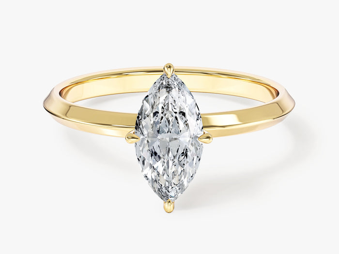 Dainty marquise lab grown diamond navette ring on a knife edge shank in yellow gold, front view