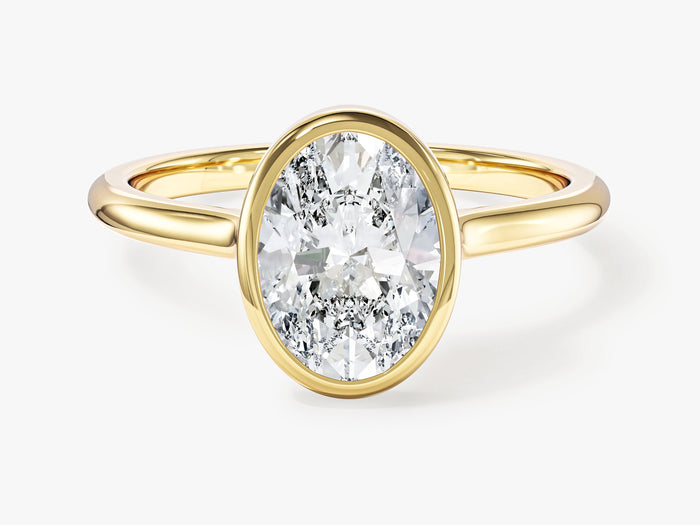 Oval lab grown diamond minimalist full bezel engagement ring in yellow gold, front view