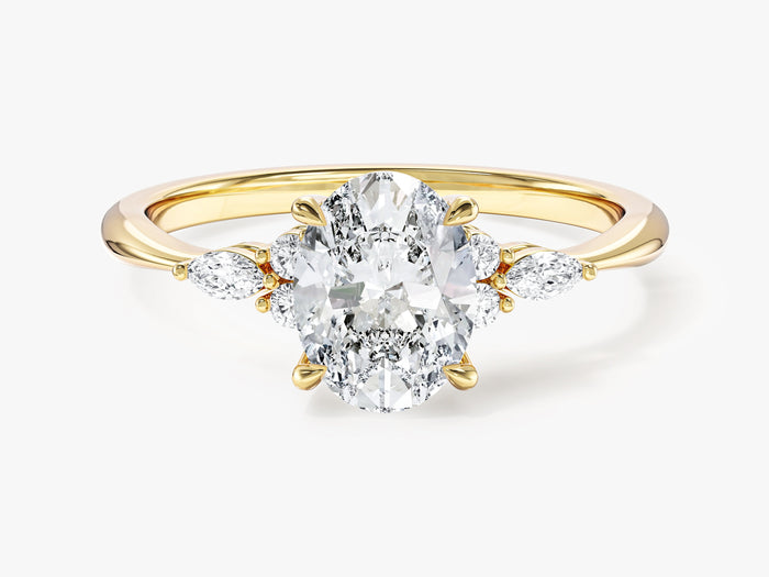 Oval moissanite seven stone cluster engagement ring on a tapered yellow gold band, front view