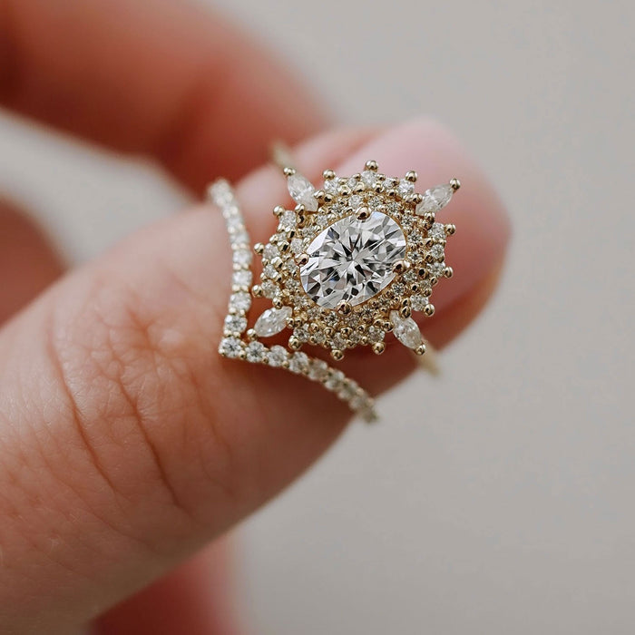 Oval cut moissanite double halo sunburst engagement ring in yellow gold, view 2
