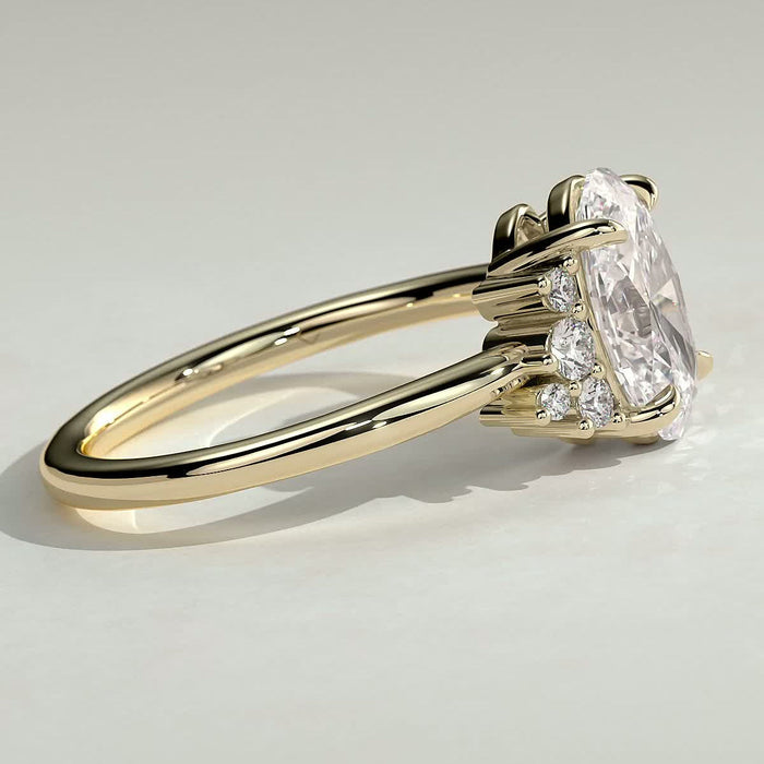 Oval cut moissanite scattered cluster shoulder engagement ring in yellow gold, view 2