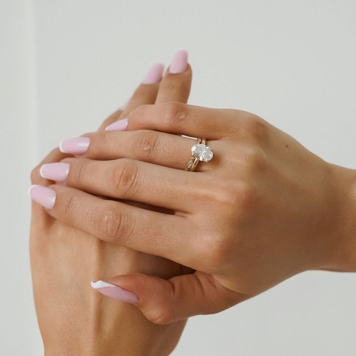 Oval cut moissanite classic solitaire engagement ring in rose gold, view 2