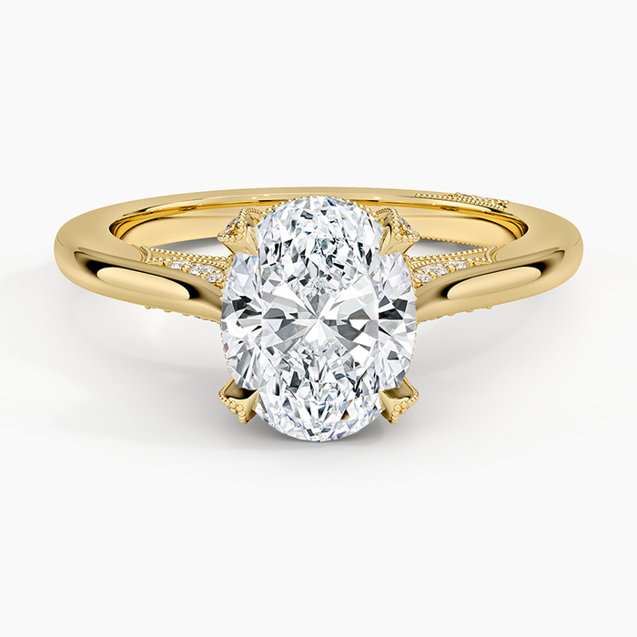 Oval moissanite milgrain split shoulder pave ring in yellow gold, top view