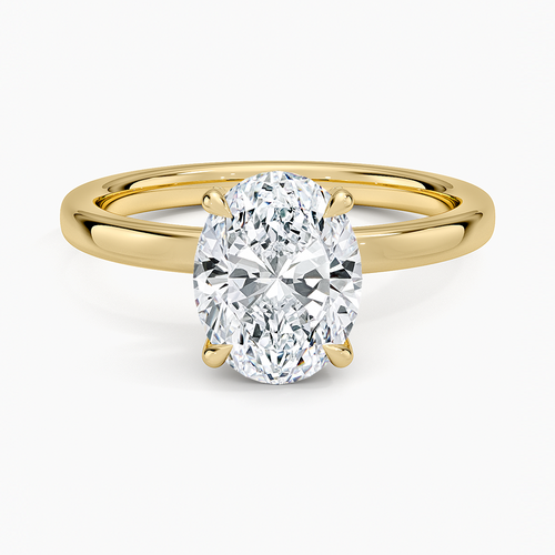 Oval moissanite classic four claw plain band ring in yellow gold, top view