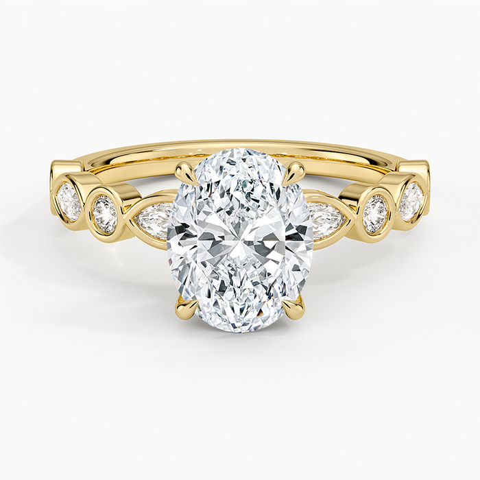 Oval moissanite with bezel set marquise and round accents in yellow gold, top view