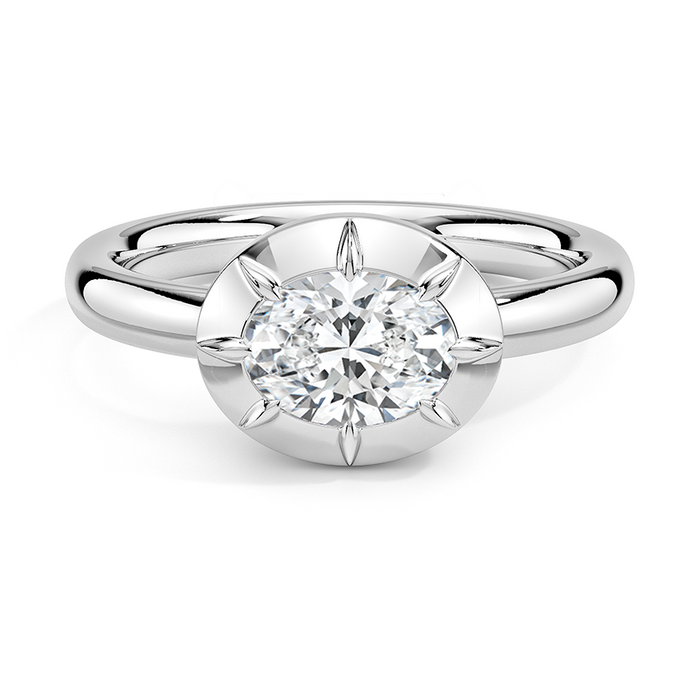 East west oval moissanite in a solid white gold halo, top view