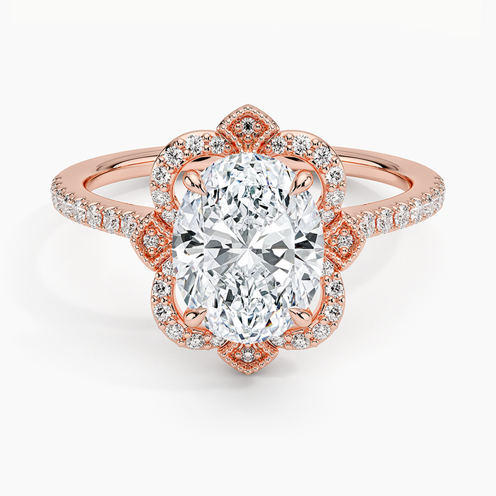 Oval moissanite in a scalloped floral halo in rose gold, top view