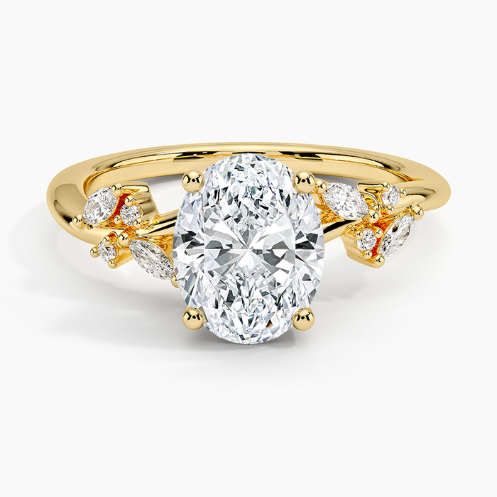 Oval moissanite with marquise leaf accents in yellow gold, top view