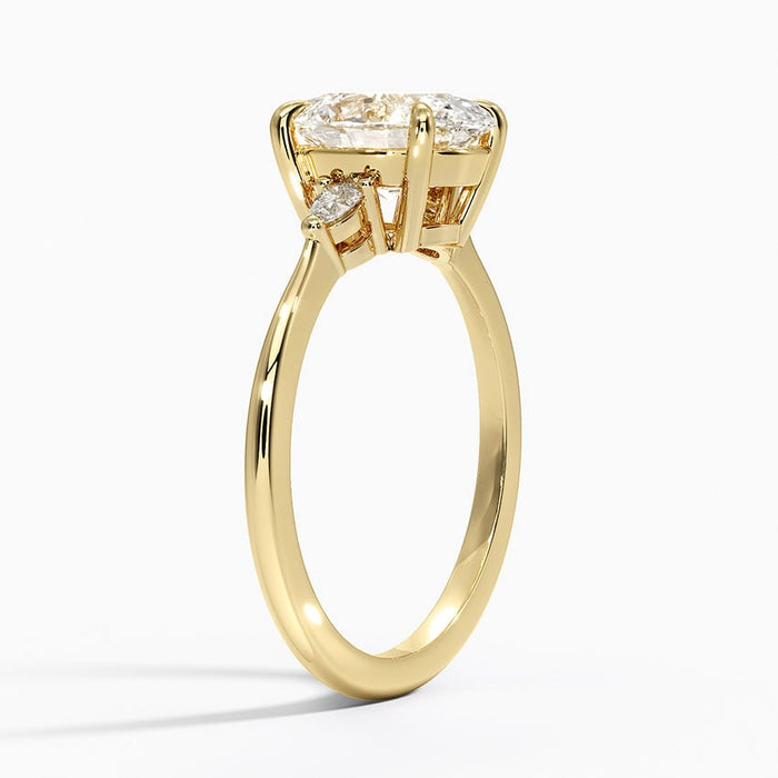 Side profile showing the low set petite pear and slim tapered band