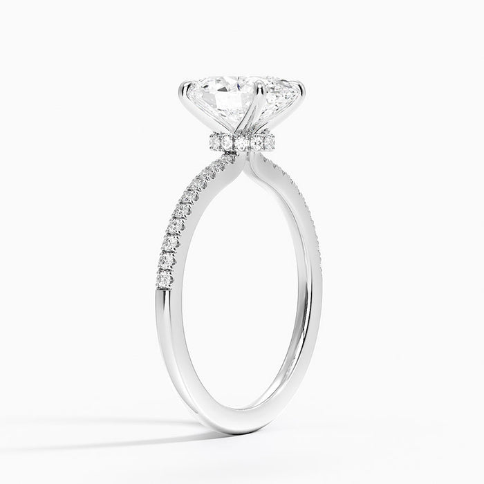 Side view showing the accent collar beneath the oval and scalloped pave