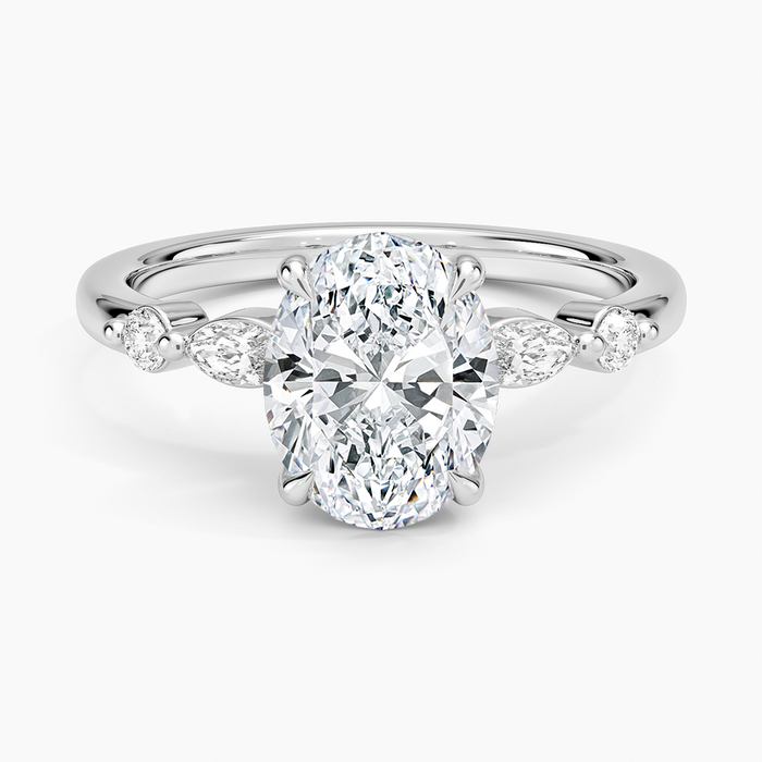 Oval moissanite with spaced marquise and round accents in white gold, top view