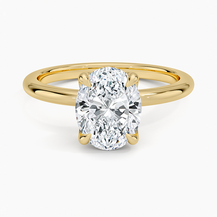 Oval moissanite tulip basket solitaire engagement ring in yellow gold, top view