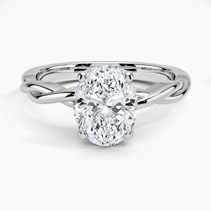 Oval moissanite solitaire on a twisted two strand white gold band, top view