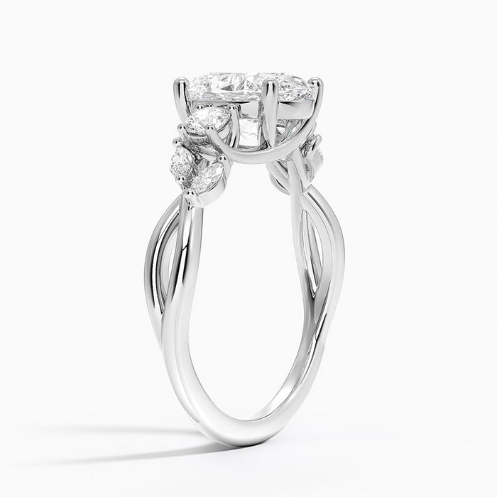 Side view showing the round side stones, marquise leaves and braided vine shank