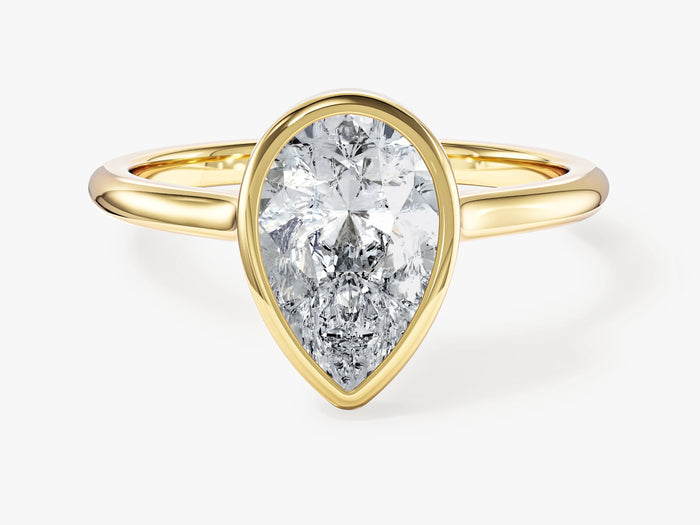 Pear lab grown diamond bezel set solitaire engagement ring in yellow gold, front view