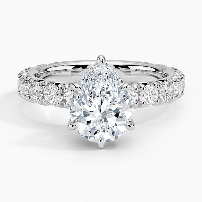 Pear cut moissanite large shared prong wide pave engagement ring in white gold, top view