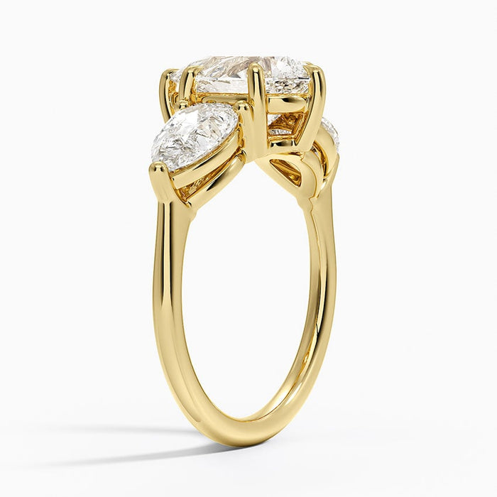 Side view showing all three stones set at the same height on a slim band