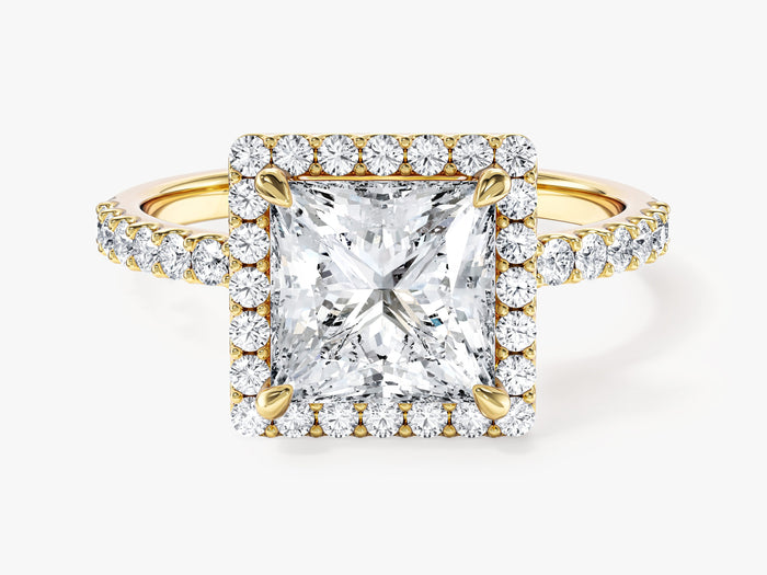 Princess cut lab grown diamond halo engagement ring with pave band in yellow gold, front view
