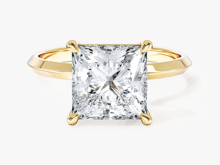 High set princess cut lab grown diamond statement solitaire with knife edge band in yellow gold, front view