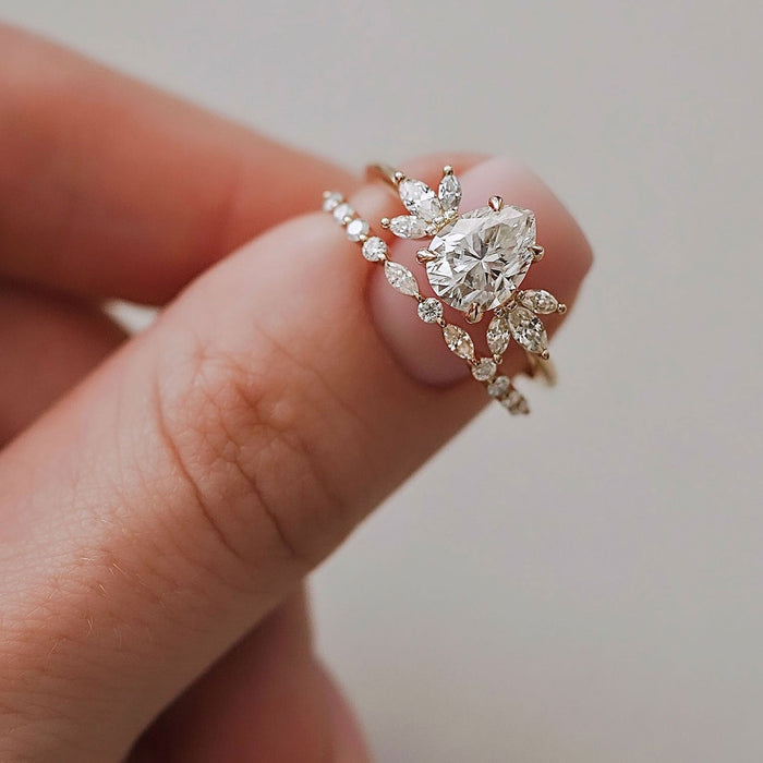 Pear cut moissanite marquise wing cluster engagement ring in yellow gold, view 2