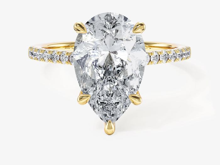 Large pear lab grown diamond statement engagement ring with micro pave band in yellow gold, front view