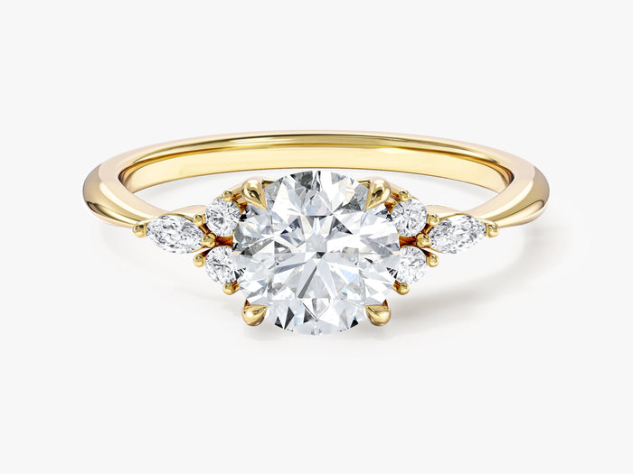 Round lab grown diamond engagement ring with marquise and round cluster accents in yellow gold, front view