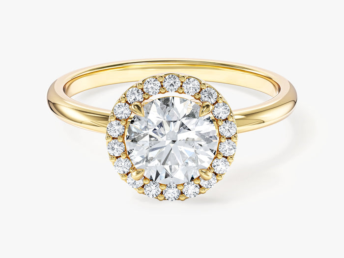 Classic round moissanite halo engagement ring with plain band in yellow gold, front view