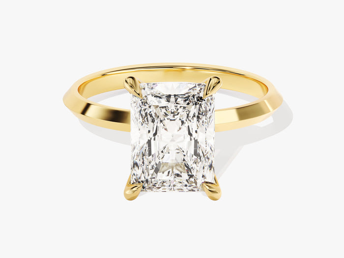 Large radiant moissanite knife edge statement engagement ring with talon claws in 14K yellow gold