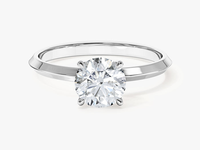 Round lab grown diamond knife edge solitaire engagement ring with four prong head in white gold, front view