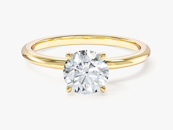 Round lab grown diamond classic solitaire with rounded comfort band in yellow gold, front view