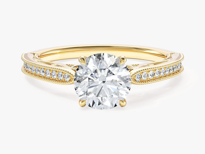 Vintage round moissanite engagement ring with milgrain channel band in 14K yellow gold, front view