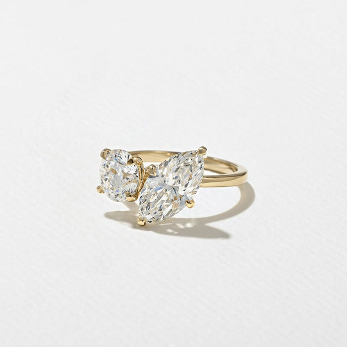 Marquise and round cut moissanite toi et moi engagement ring in yellow gold, view 2