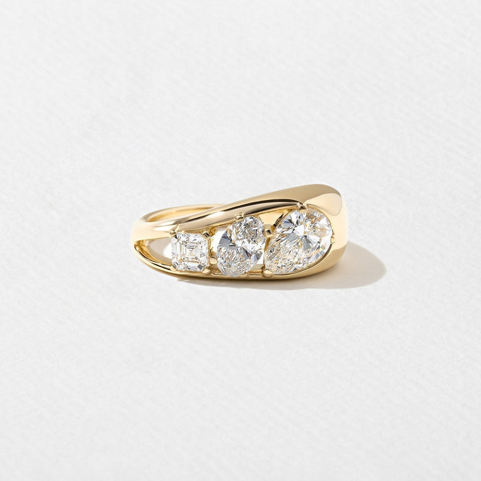 Pear oval and asscher moissanite three stone dome engagement ring in yellow gold