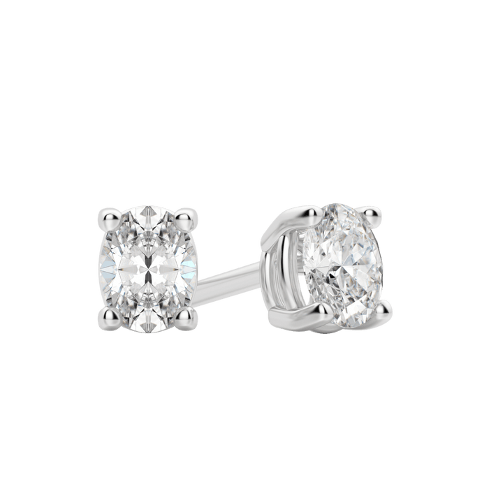 Pair of white gold oval lab grown diamond stud earrings in four prong settings