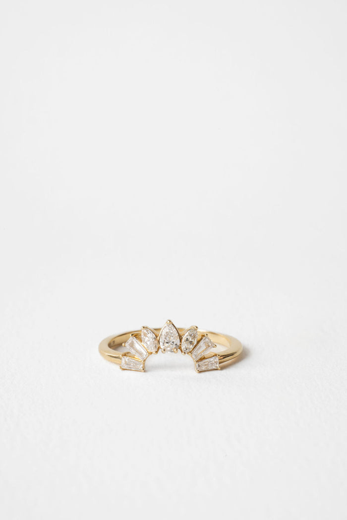 Pear, marquise and tapered baguette moissanite curved fan wedding band 0.50 CT TW in yellow gold, front view