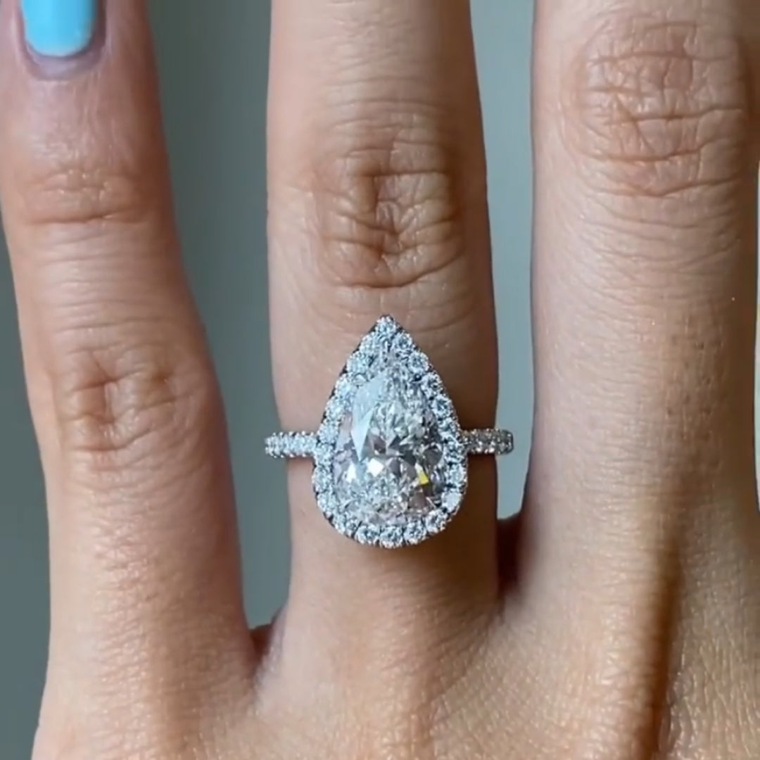 Unique Pear Cut Pave Halo Moissanite Ring
