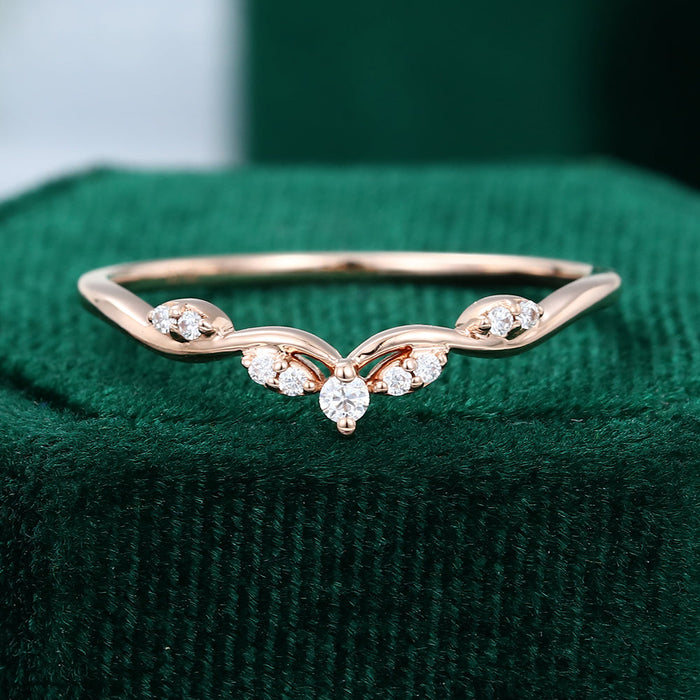 Round moissanite art deco crown curved wedding band, front view in rose gold