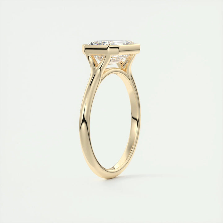 East-West Emerald Cut Moissanite Bezel Engagement Ring: A Buyer's Guide