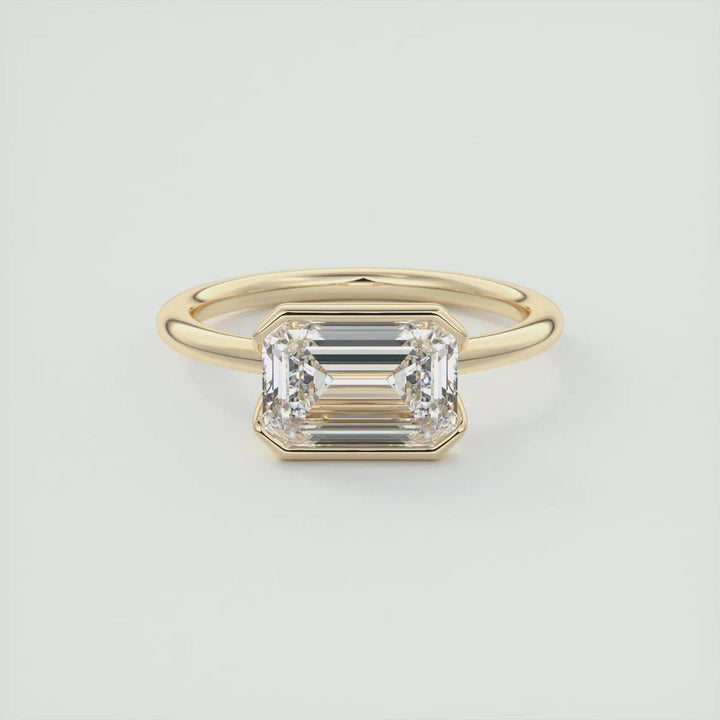 East-West Emerald Cut Moissanite Half Bezel Minimalist Ring: A Buyer's Guide