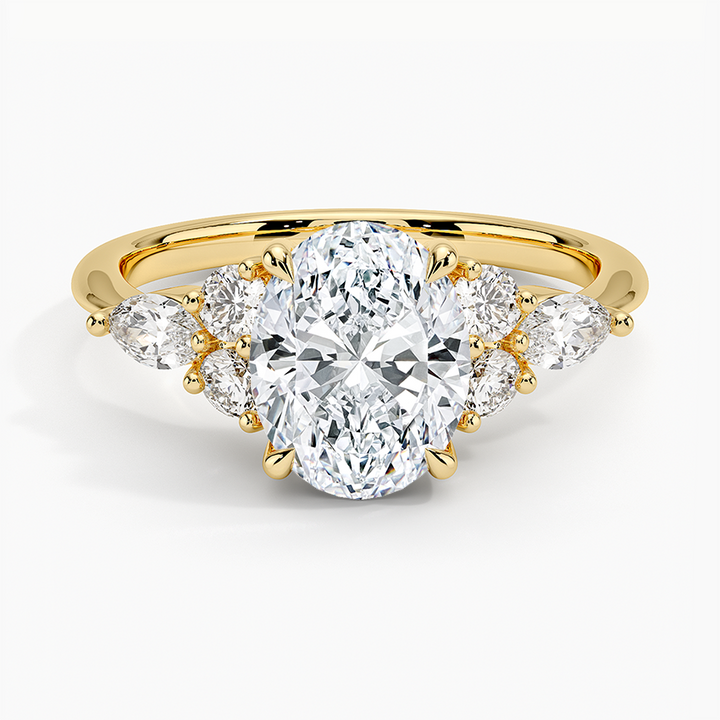 Oval Moissanite Ring with Pear and Round Side Clusters: A Buyer's Guide