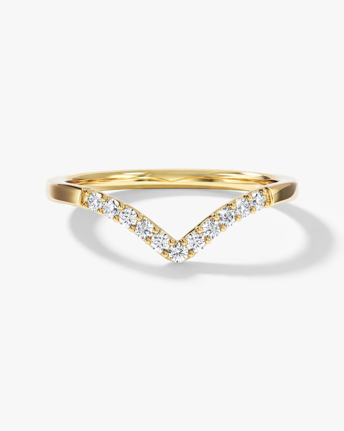 Round moissanite V-shaped curved wedding band in yellow gold, front view