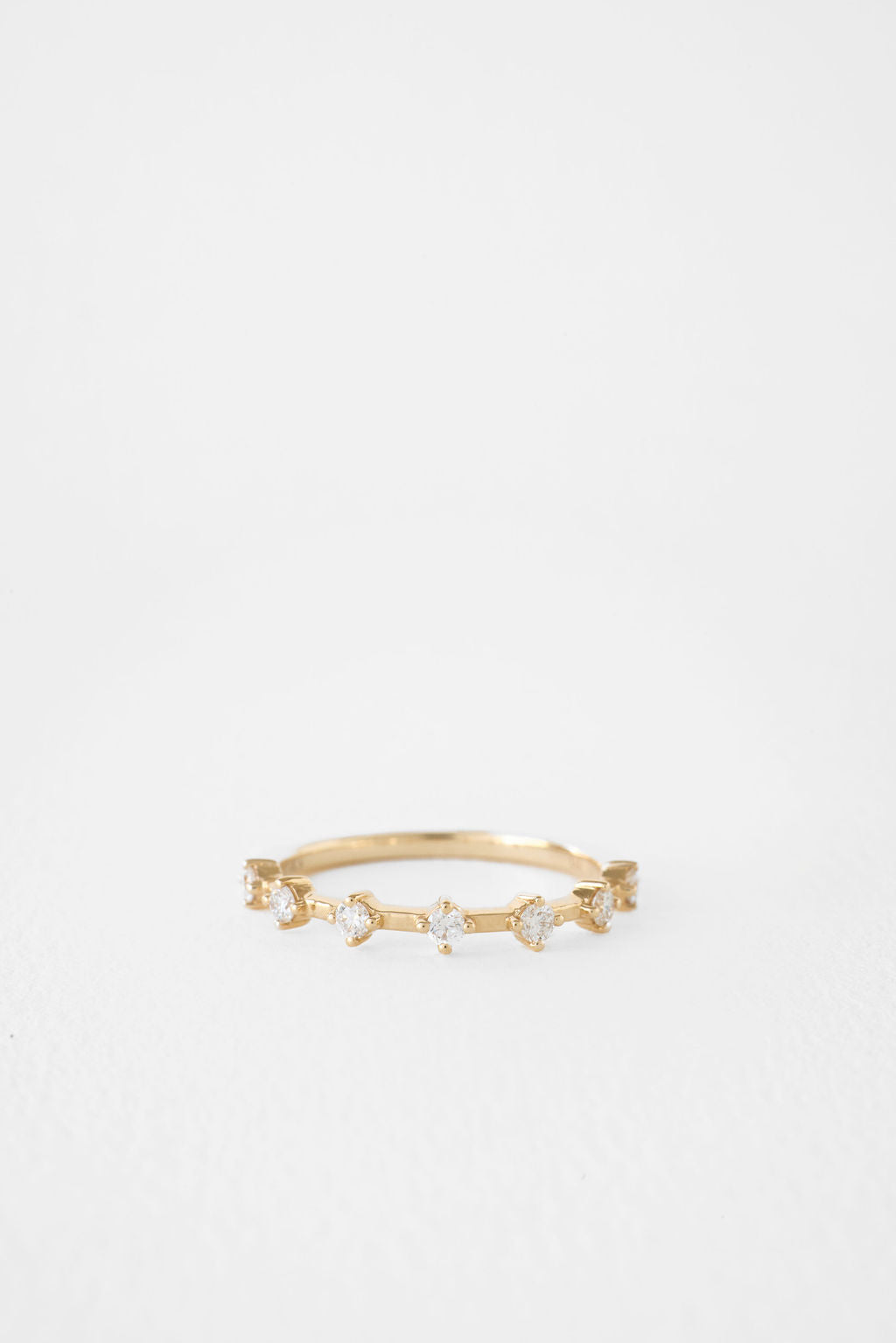 Round dainty prong set lab grown diamond wedding band